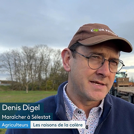 Denis Digel, maraîcher à Sélestat, était dans son tracteur, lundi, pour défiler sur le Pont de l'Europe avec ses collègues agriculteurs. Explications...